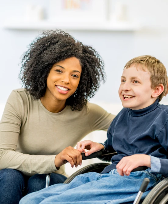 ndis-lady-and-boy-smiling