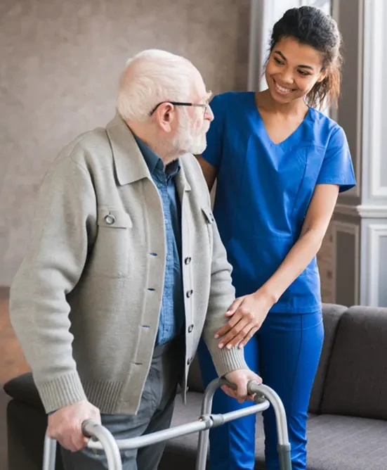 young-nurse-helping-elderly-disable-man